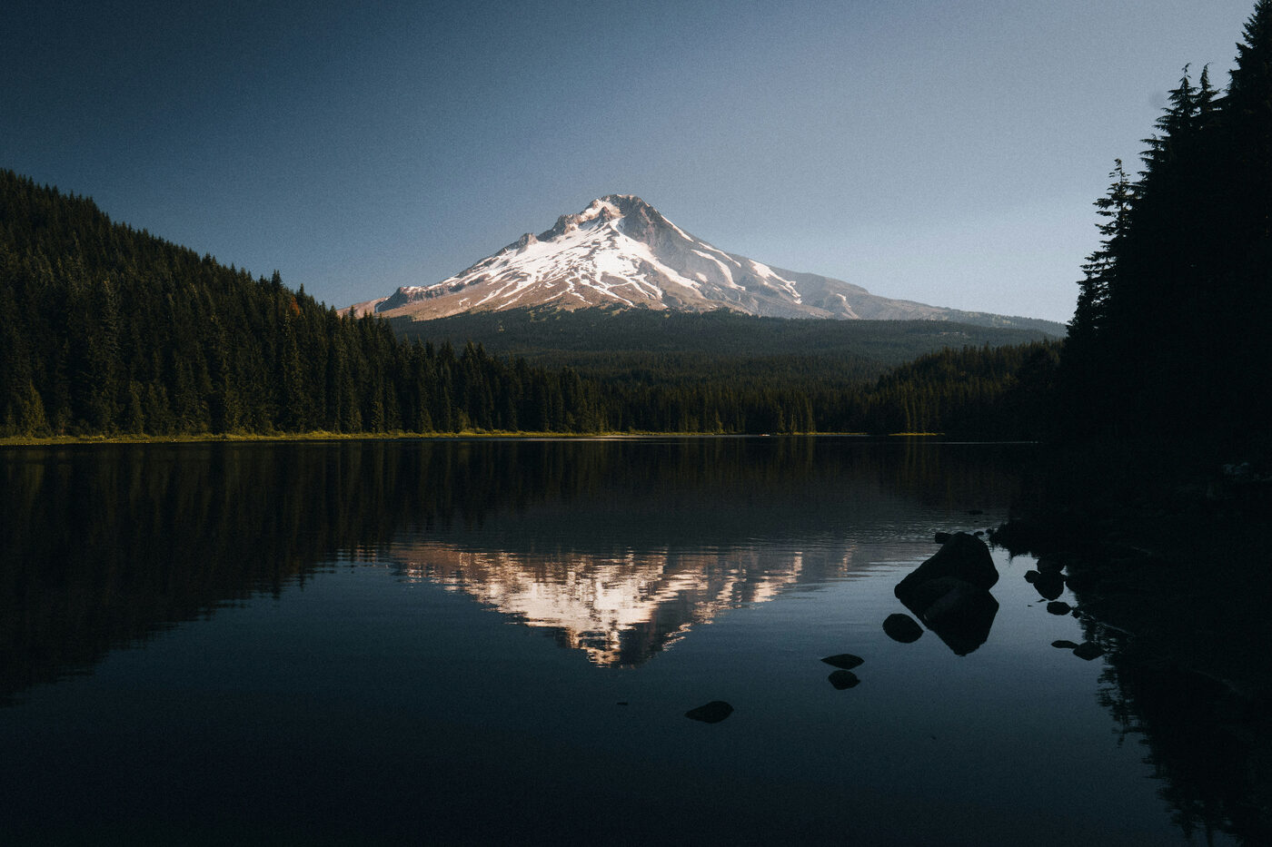 Snow-capped Central Oregon mountain above a calm lake
